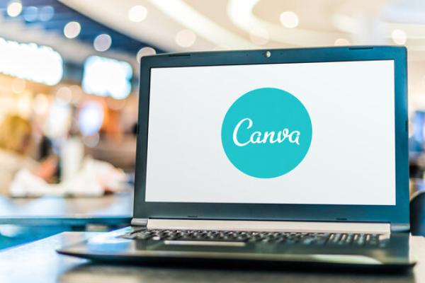 Laptop with the Canva logo displayed
