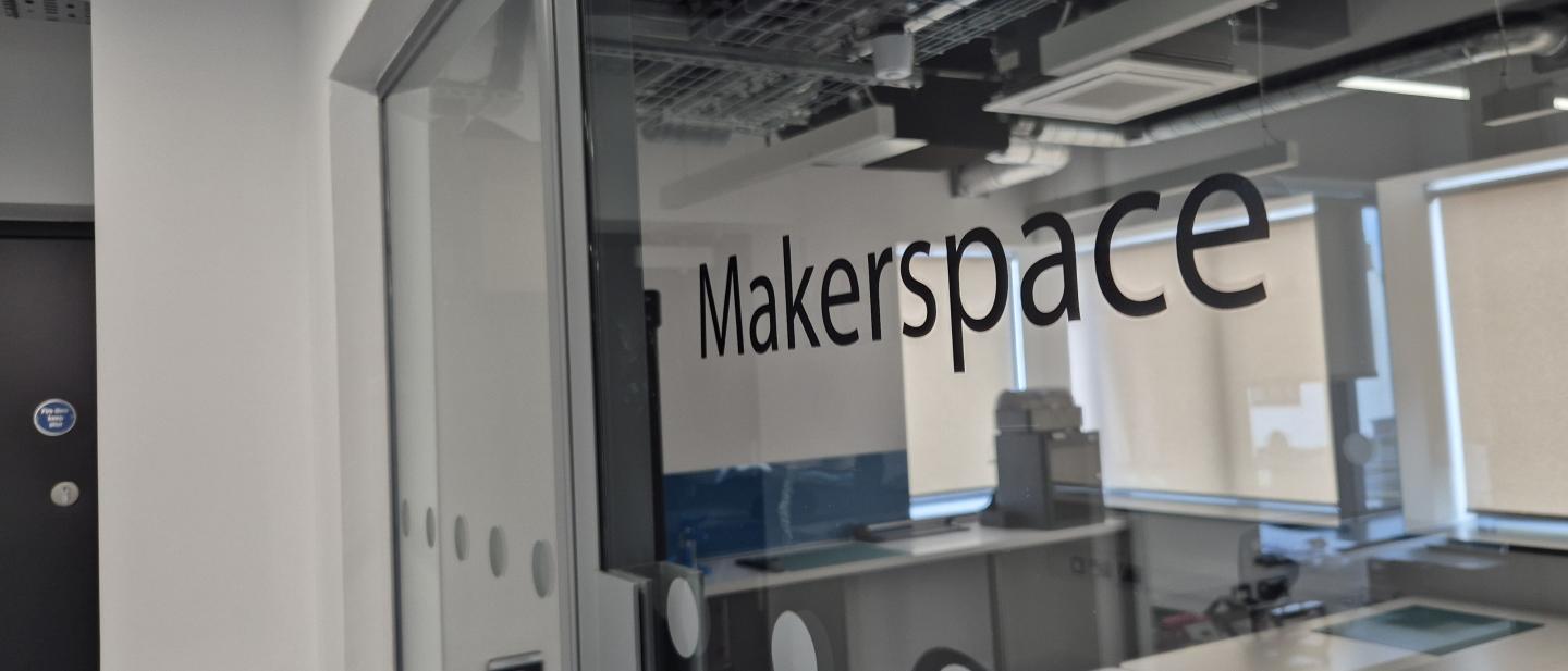 Glass door leading the makerspace