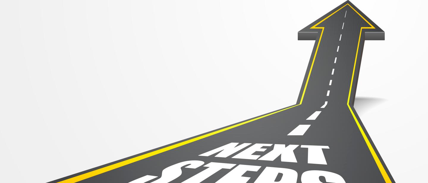 Road with "next steps" text